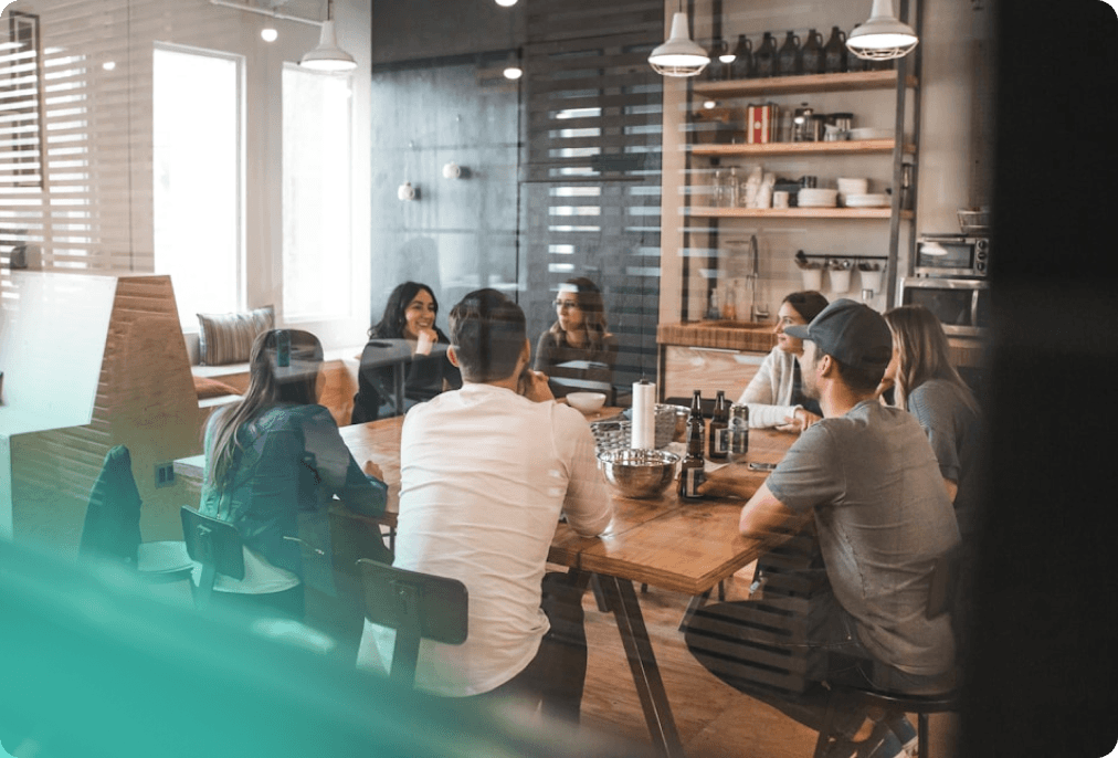 Affordable home ownership team collaborating around a table